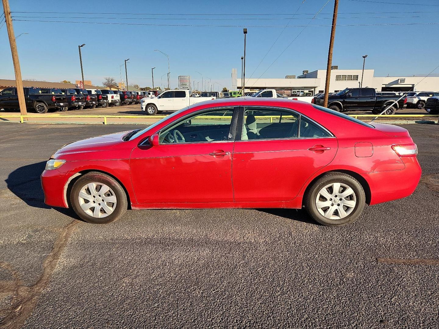 2011 RED Toyota Camry LE (4T1BF3EKXBU) with an 2.5L I-4 DOHC, variable valve control, regular unleaded, engine with 169HP engine, located at 4711 Ave Q, Lubbock, TX, 79412, (806) 687-2362, 33.551304, -101.855293 - Photo#1