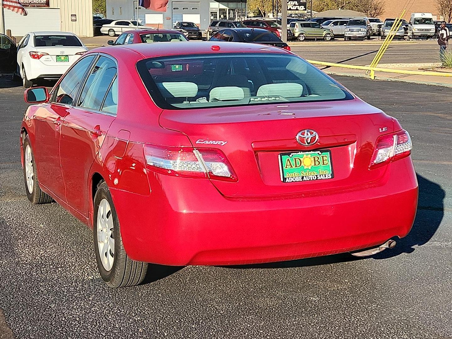2011 RED Toyota Camry LE (4T1BF3EKXBU) with an 2.5L I-4 DOHC, variable valve control, regular unleaded, engine with 169HP engine, located at 4711 Ave Q, Lubbock, TX, 79412, (806) 687-2362, 33.551304, -101.855293 - Photo#2