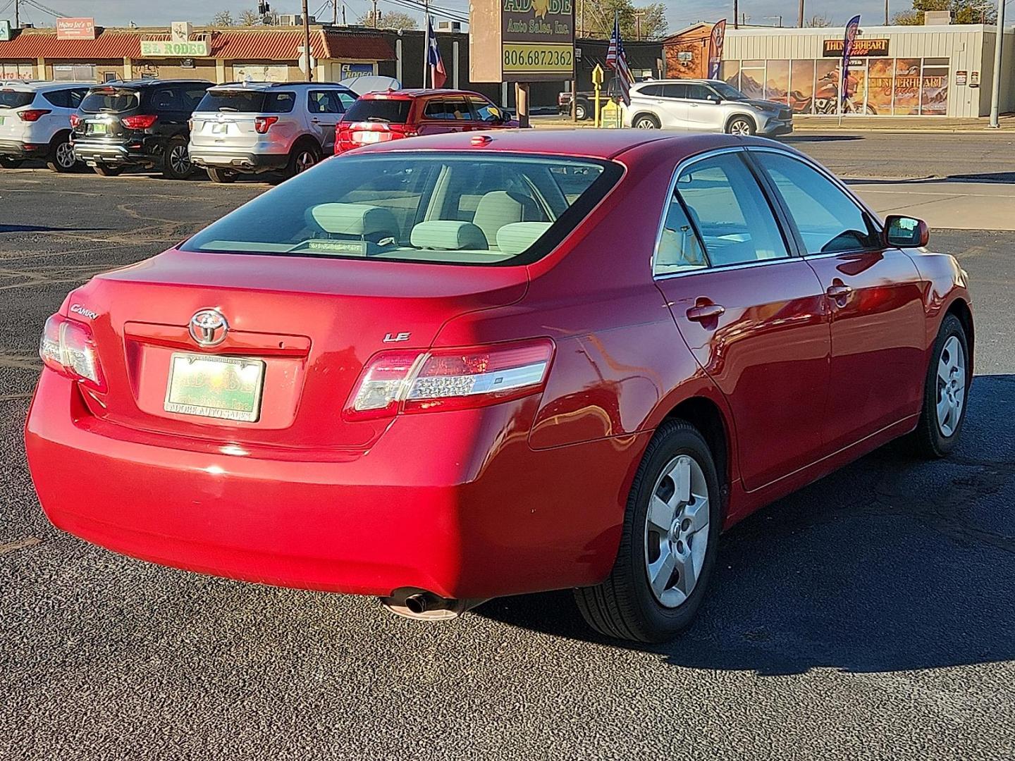 2011 RED Toyota Camry LE (4T1BF3EKXBU) with an 2.5L I-4 DOHC, variable valve control, regular unleaded, engine with 169HP engine, located at 4711 Ave Q, Lubbock, TX, 79412, (806) 687-2362, 33.551304, -101.855293 - Photo#3