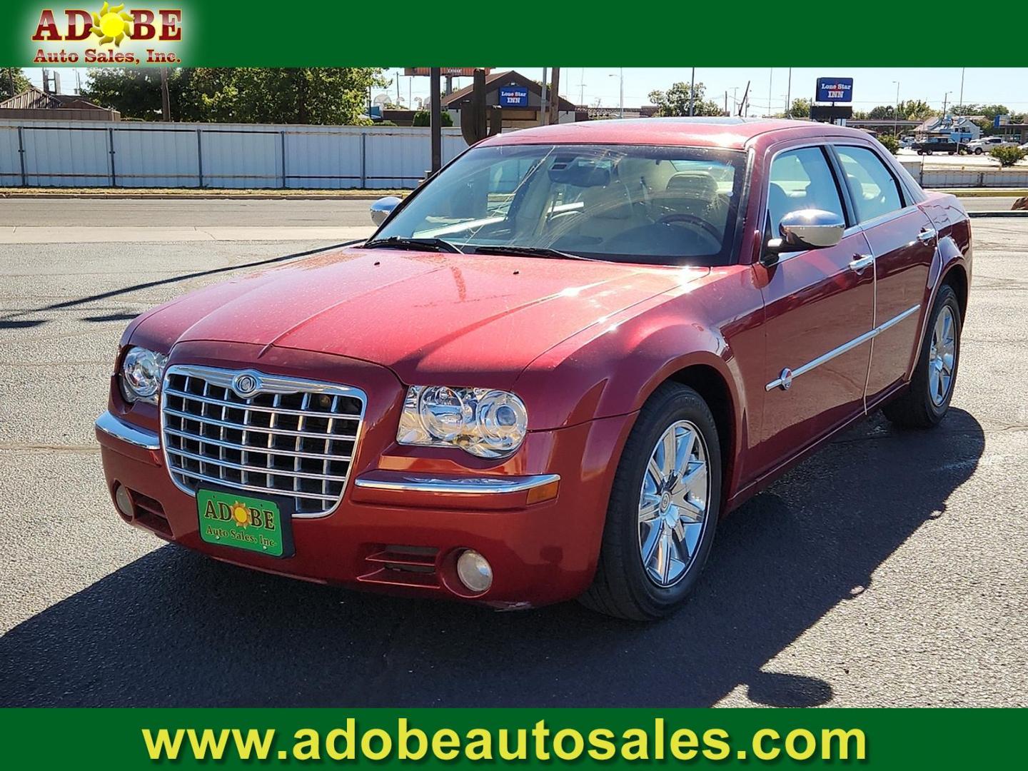 2008 RED Chrysler 300C Hemi (2C3LA63HX8H) with an HEMI 5.7L V-8 regular unleaded, engine with cylinder deactivation and 340HP engine, located at 4711 Ave Q, Lubbock, TX, 79412, (806) 687-2362, 33.551304, -101.855293 - Photo#0