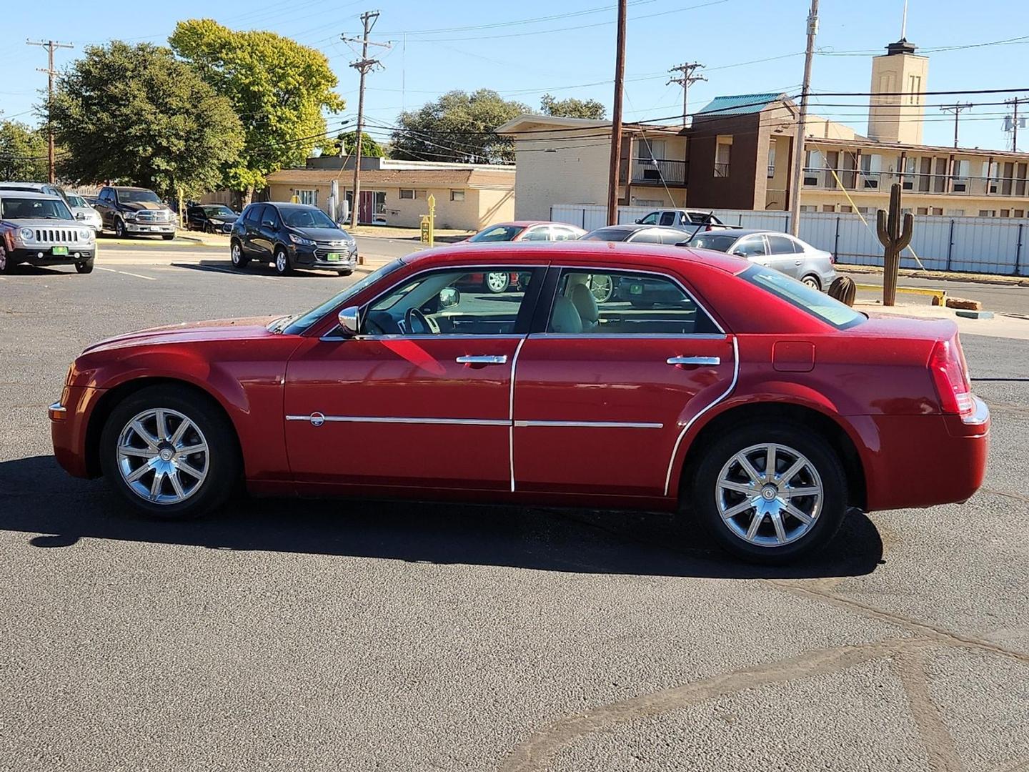 2008 RED Chrysler 300C Hemi (2C3LA63HX8H) with an HEMI 5.7L V-8 regular unleaded, engine with cylinder deactivation and 340HP engine, located at 4711 Ave Q, Lubbock, TX, 79412, (806) 687-2362, 33.551304, -101.855293 - Photo#1