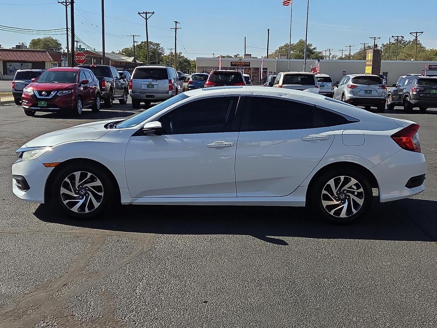 2017 White Orchid Pearl - WA /Ivory - IV Honda Civic EX (2HGFC2F77HH) with an 2L I-4 DOHC, variable valve control, regular unleaded, engine with 158HP engine, located at 4711 Ave Q, Lubbock, TX, 79412, (806) 687-2362, 33.551304, -101.855293 - Photo#1