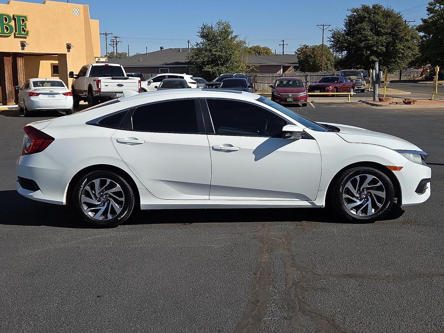 2017 White Orchid Pearl - WA /Ivory - IV Honda Civic EX (2HGFC2F77HH) with an 2L I-4 DOHC, variable valve control, regular unleaded, engine with 158HP engine, located at 4711 Ave Q, Lubbock, TX, 79412, (806) 687-2362, 33.551304, -101.855293 - Photo#5