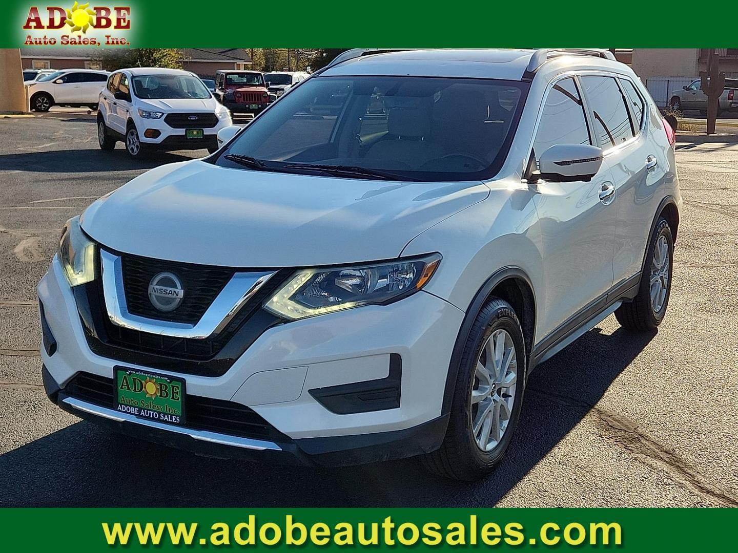 2018 WHITE Nissan Rogue SV (5N1AT2MTXJC) with an 2.5L I-4 DOHC, variable valve control, regular unleaded, engine with 170HP engine, located at 4711 Ave Q, Lubbock, TX, 79412, (806) 687-2362, 33.551304, -101.855293 - Photo#0