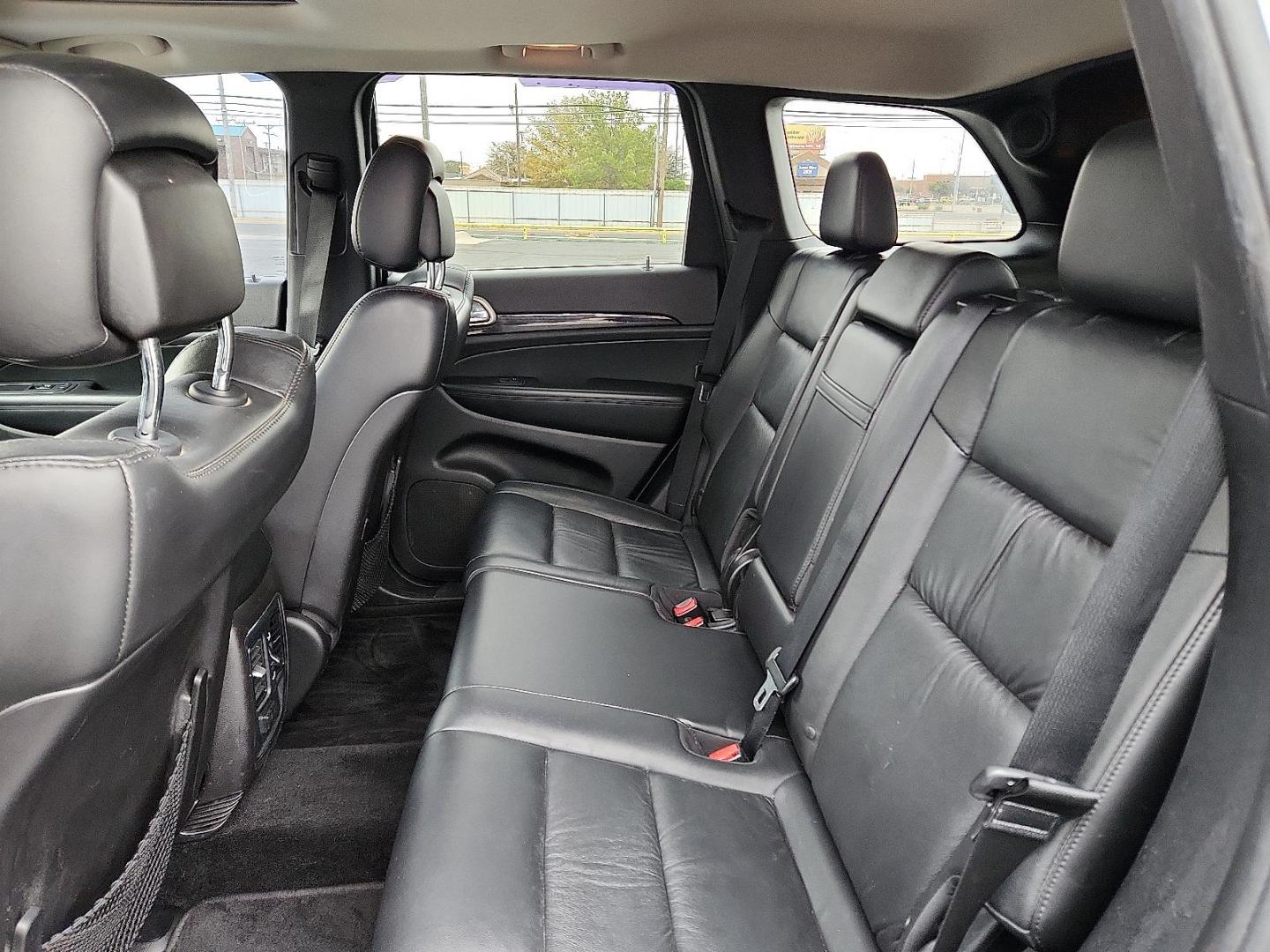 2013 BLUE Jeep Grand Cherokee Laredo (1C4RJFAT7DC) with an HEMI 5.7L V-8 variable valve control, regular unleaded, engine with cylinder deactivation and 360HP engine, located at 4711 Ave Q, Lubbock, TX, 79412, (806) 687-2362, 33.551304, -101.855293 - Photo#11