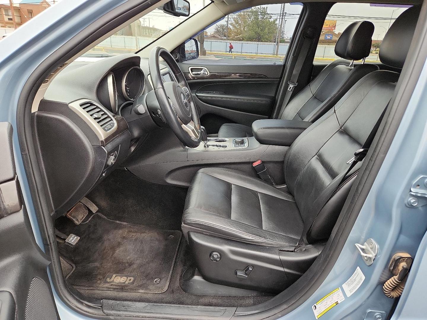2013 BLUE Jeep Grand Cherokee Laredo (1C4RJFAT7DC) with an HEMI 5.7L V-8 variable valve control, regular unleaded, engine with cylinder deactivation and 360HP engine, located at 4711 Ave Q, Lubbock, TX, 79412, (806) 687-2362, 33.551304, -101.855293 - Photo#14