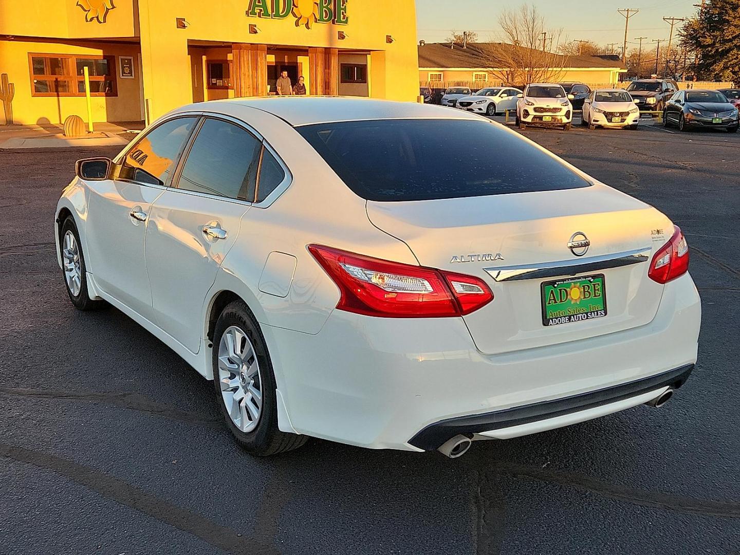 2017 WHITE Nissan Altima 2.5 S (1N4AL3AP6HC) with an 2.5L I-4 DOHC, variable valve control, regular unleaded, engine with 179HP engine, located at 4711 Ave Q, Lubbock, TX, 79412, (806) 687-2362, 33.551304, -101.855293 - Photo#2