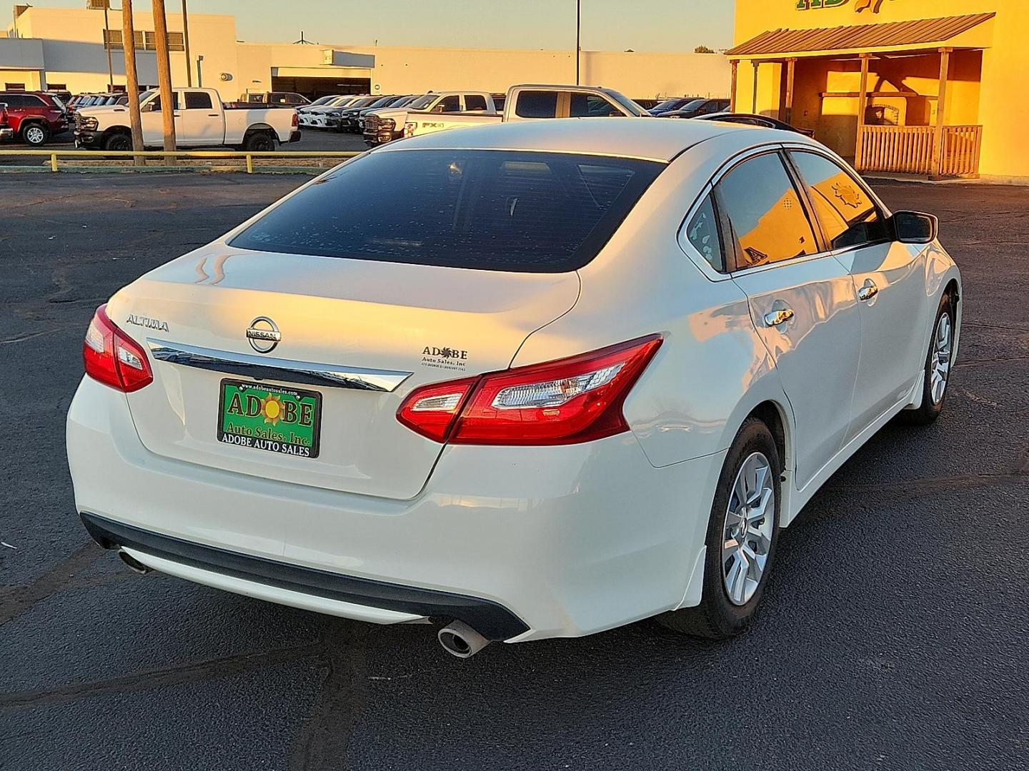 2017 WHITE Nissan Altima 2.5 S (1N4AL3AP6HC) with an 2.5L I-4 DOHC, variable valve control, regular unleaded, engine with 179HP engine, located at 4711 Ave Q, Lubbock, TX, 79412, (806) 687-2362, 33.551304, -101.855293 - Photo#3