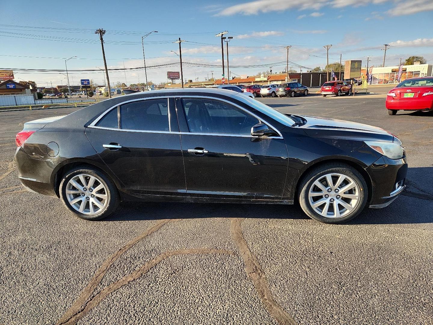 2015 BLACK Chevrolet Malibu 1LZ (1G11F5SLXFF) with an ECOTEC 2.5L I-4 gasoline direct injection, DOHC, variable valve control, regular unleaded, engine with 196HP engine, located at 4711 Ave Q, Lubbock, TX, 79412, (806) 687-2362, 33.551304, -101.855293 - Photo#4