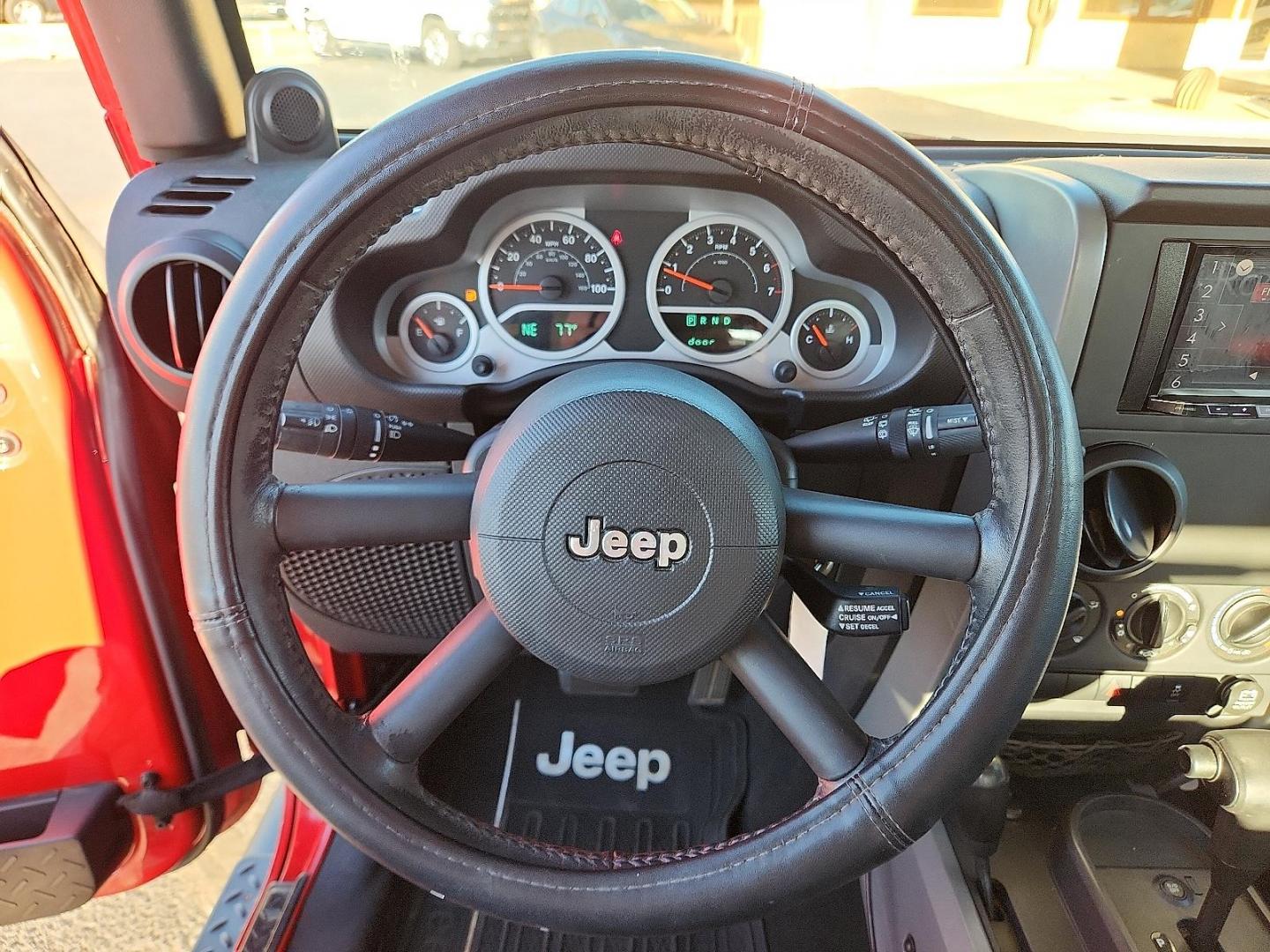 2010 RED Jeep Wrangler Sport (1J4AA2D18AL) with an 3.8L V-6 regular unleaded, engine with 202HP engine, located at 4711 Ave Q, Lubbock, TX, 79412, (806) 687-2362, 33.551304, -101.855293 - Photo#16