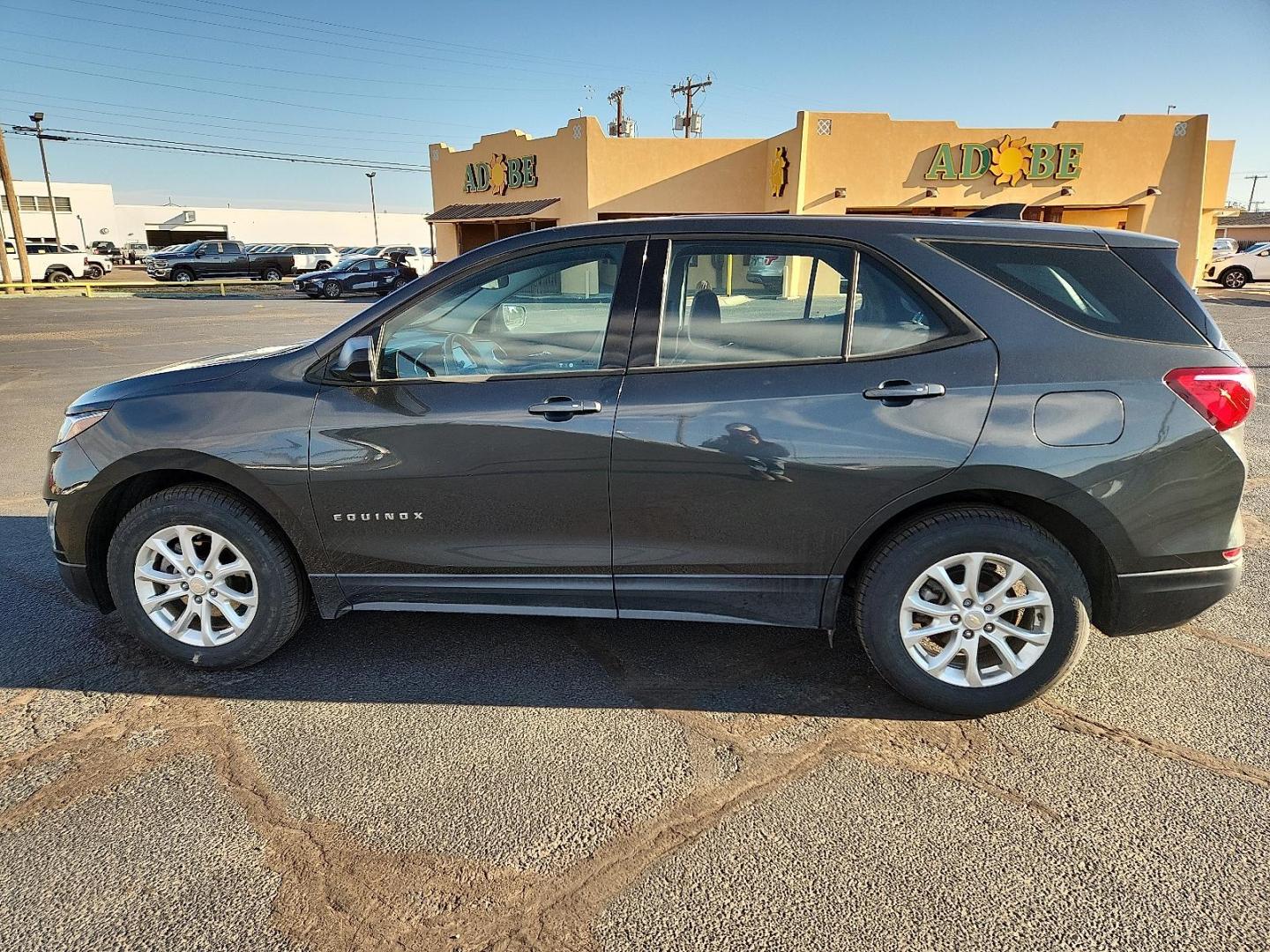 2019 GRAY Chevrolet Equinox LS (2GNAXSEV7K6) with an 1.5L I-4 gasoline direct injection, DOHC, VVT variable valve control, intercooled turbo, regular unleaded, engine with 170HP engine, located at 4711 Ave Q, Lubbock, TX, 79412, (806) 687-2362, 33.551304, -101.855293 - Photo#1