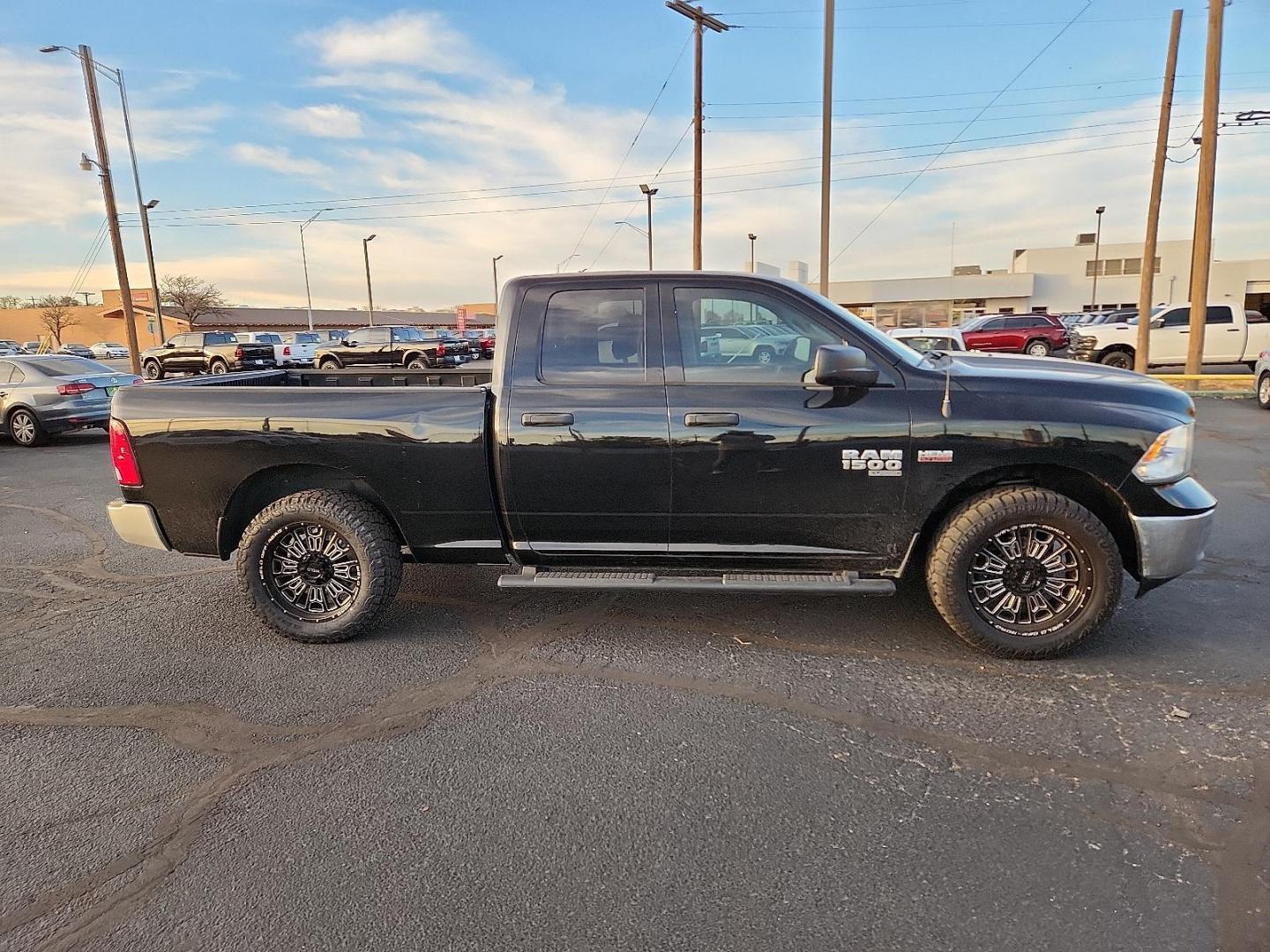 2019 BLACK Ram 1500 Classic Tradesman Quad Cab 4x2 6'4" Box (1C6RR6FT9KS) with an HEMI 5.7L V-8 variable valve control, regular unleaded, engine with cylinder deactivation and 395HP engine, located at 4711 Ave Q, Lubbock, TX, 79412, (806) 687-2362, 33.551304, -101.855293 - Photo#4