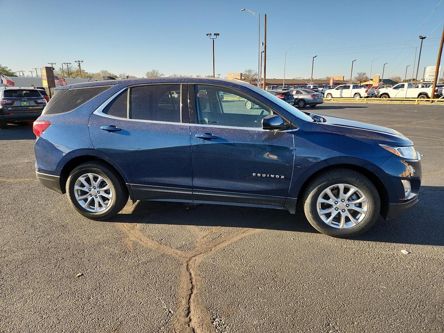2020 BLUE Chevrolet Equinox FWD 2FL (2GNAXJEV1L6) with an 1.5L I-4 gasoline direct injection, DOHC, VVT variable valve control, intercooled turbo, regular unleaded, engine with 170HP engine, located at 4711 Ave Q, Lubbock, TX, 79412, (806) 687-2362, 33.551304, -101.855293 - Photo#4