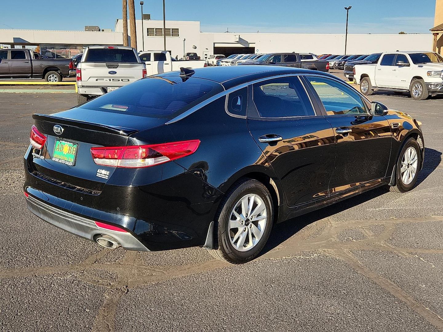 2016 BLACK Kia Optima LX (5XXGT4L35GG) with an Theta II 2.4L I-4 gasoline direct injection, DOHC, CVVT variable valve control, regular unleaded, engine with 185HP engine, located at 4711 Ave Q, Lubbock, TX, 79412, (806) 687-2362, 33.551304, -101.855293 - Photo#3