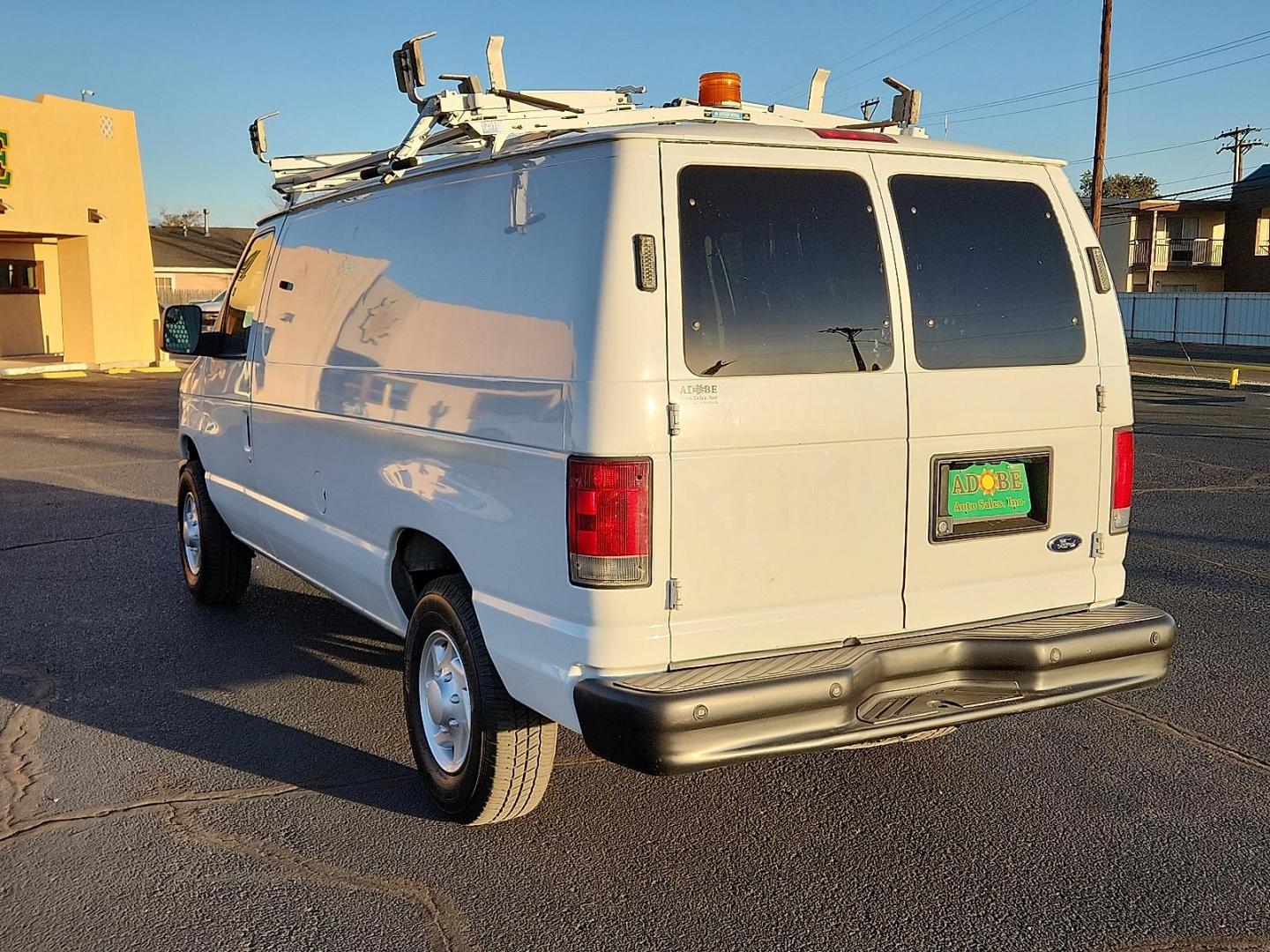 2011 WHITE Ford E-250 Commercial (1FTNE2EL3BD) with an Triton 5.4L V-8 engine with 255HP engine, located at 4711 Ave Q, Lubbock, TX, 79412, (806) 687-2362, 33.551304, -101.855293 - Photo#2