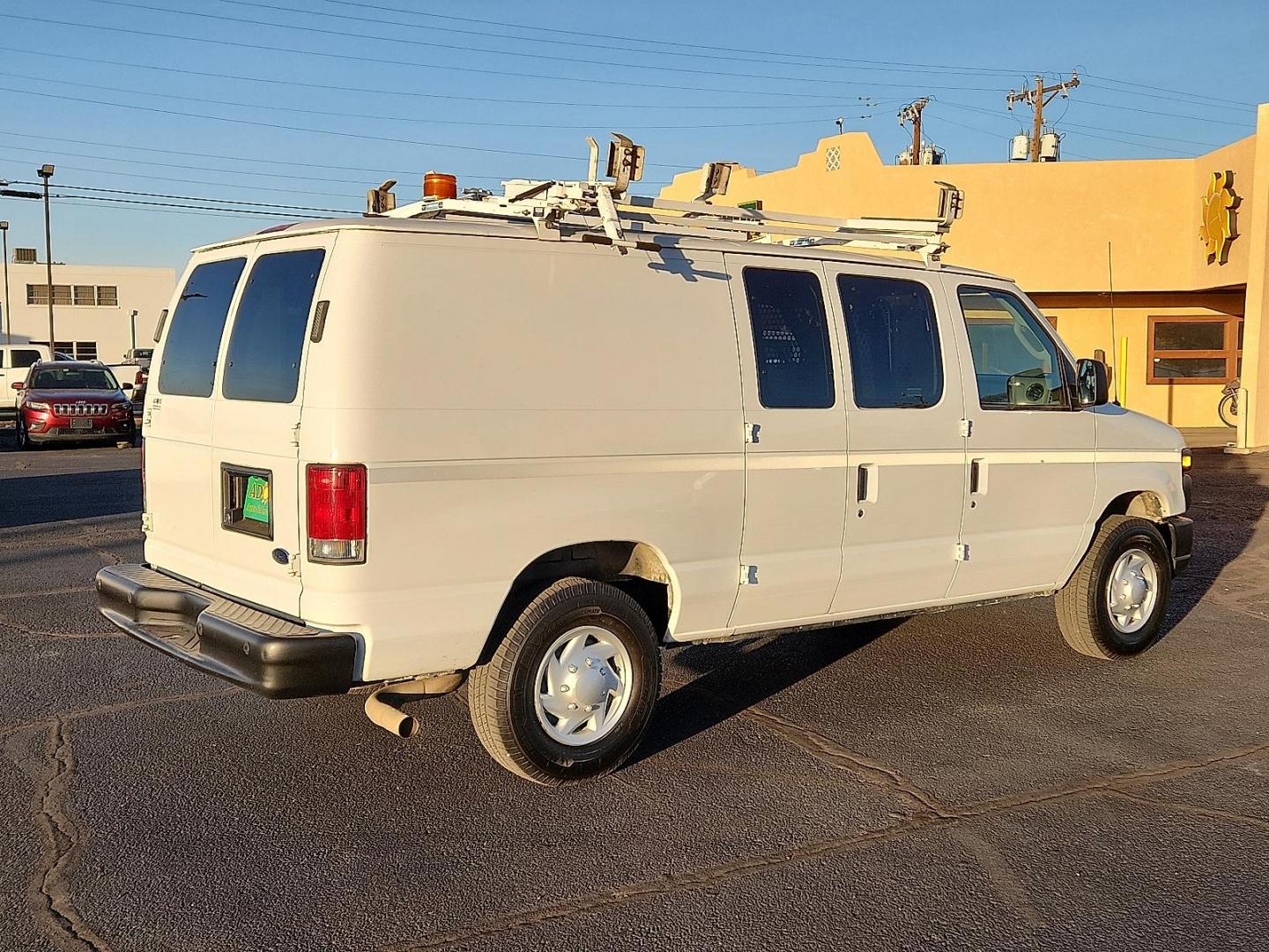 2011 WHITE Ford E-250 Commercial (1FTNE2EL3BD) with an Triton 5.4L V-8 engine with 255HP engine, located at 4711 Ave Q, Lubbock, TX, 79412, (806) 687-2362, 33.551304, -101.855293 - Photo#3