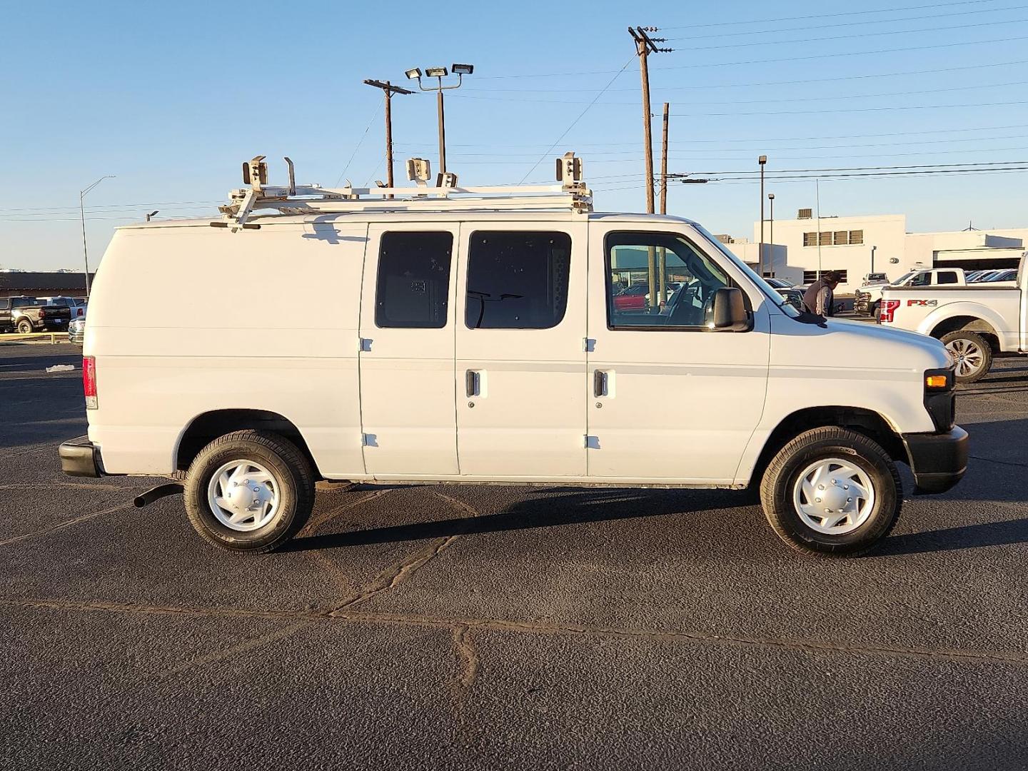 2011 WHITE Ford E-250 Commercial (1FTNE2EL3BD) with an Triton 5.4L V-8 engine with 255HP engine, located at 4711 Ave Q, Lubbock, TX, 79412, (806) 687-2362, 33.551304, -101.855293 - Photo#4