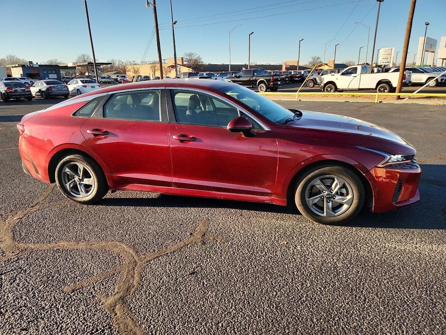 2021 RED Kia K5 LXS (5XXG14J28MG) with an Gamma-II 1.6L I-4 gasoline direct injection, DOHC, CVVD variable valve control, intercooled turbo, regular unleaded, engine with 180HP engine, located at 4711 Ave Q, Lubbock, TX, 79412, (806) 687-2362, 33.551304, -101.855293 - Photo#4