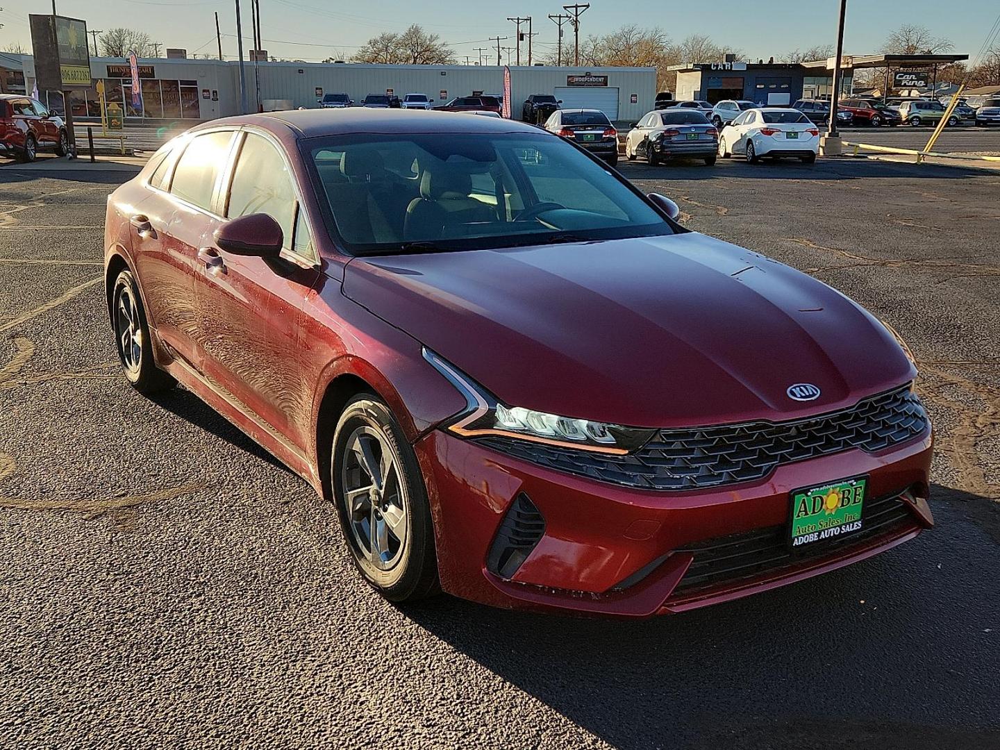 2021 RED Kia K5 LXS (5XXG14J28MG) with an Gamma-II 1.6L I-4 gasoline direct injection, DOHC, CVVD variable valve control, intercooled turbo, regular unleaded, engine with 180HP engine, located at 4711 Ave Q, Lubbock, TX, 79412, (806) 687-2362, 33.551304, -101.855293 - Photo#5