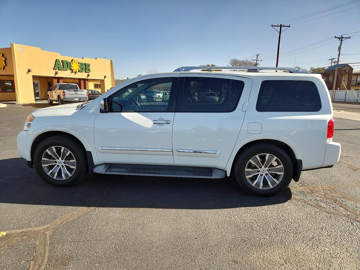 2015 WHITE Nissan Armada SL (5N1BA0ND6FN) with an Endurance 5.6L V-8 DOHC, variable valve control, regular unleaded, engine with 317HP engine, located at 4711 Ave Q, Lubbock, TX, 79412, (806) 687-2362, 33.551304, -101.855293 - Photo#1