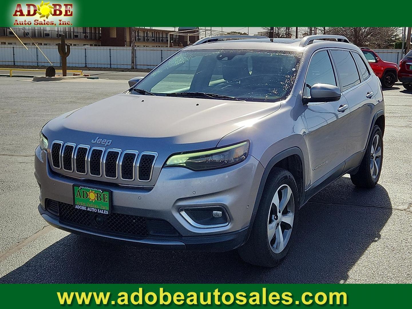 2021 SILVER Jeep Cherokee Limited 4X4 (1C4PJMDX1MD) with an Pentastar 3.2L V-6 DOHC, regular unleaded, engine with 271HP engine, located at 4711 Ave Q, Lubbock, TX, 79412, (806) 687-2362, 33.551304, -101.855293 - Photo#0