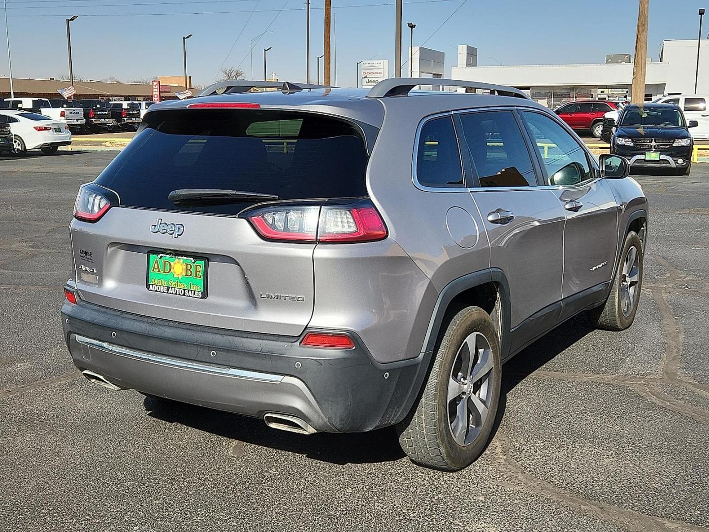 2021 SILVER Jeep Cherokee Limited 4X4 (1C4PJMDX1MD) with an Pentastar 3.2L V-6 DOHC, regular unleaded, engine with 271HP engine, located at 4711 Ave Q, Lubbock, TX, 79412, (806) 687-2362, 33.551304, -101.855293 - Photo#3