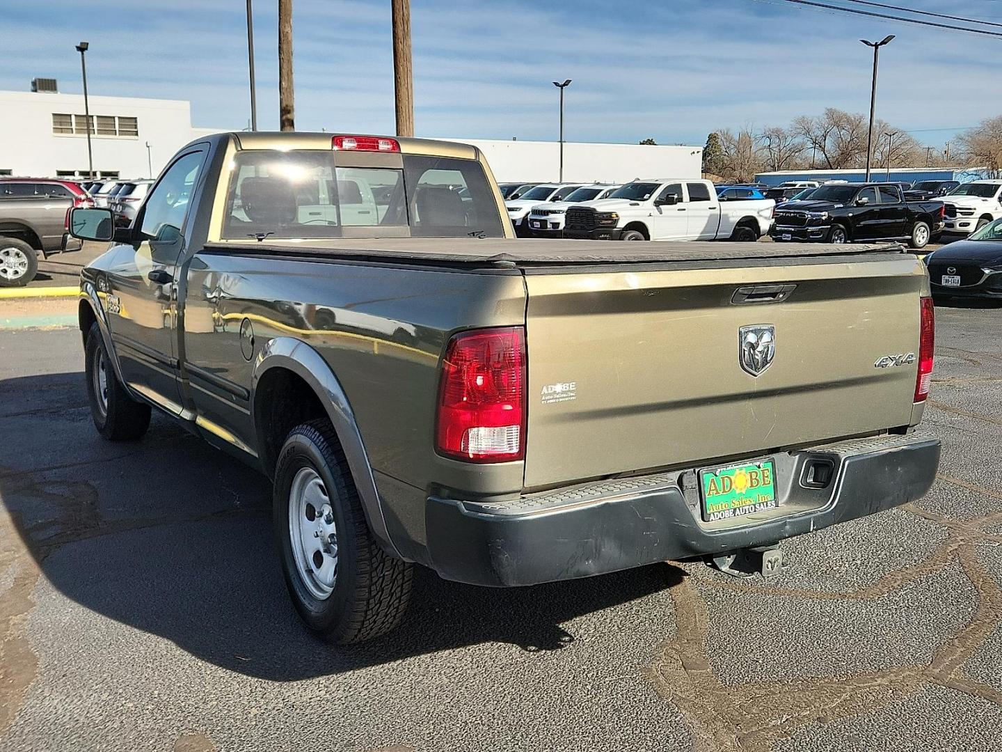 2014 GOLD Ram 1500 Tradesman (3C6JR7DG0EG) with an 3.6L V-6 DOHC, variable valve control, regular unleaded, engine with 305HP engine, located at 4711 Ave Q, Lubbock, TX, 79412, (806) 687-2362, 33.551304, -101.855293 - Photo#2