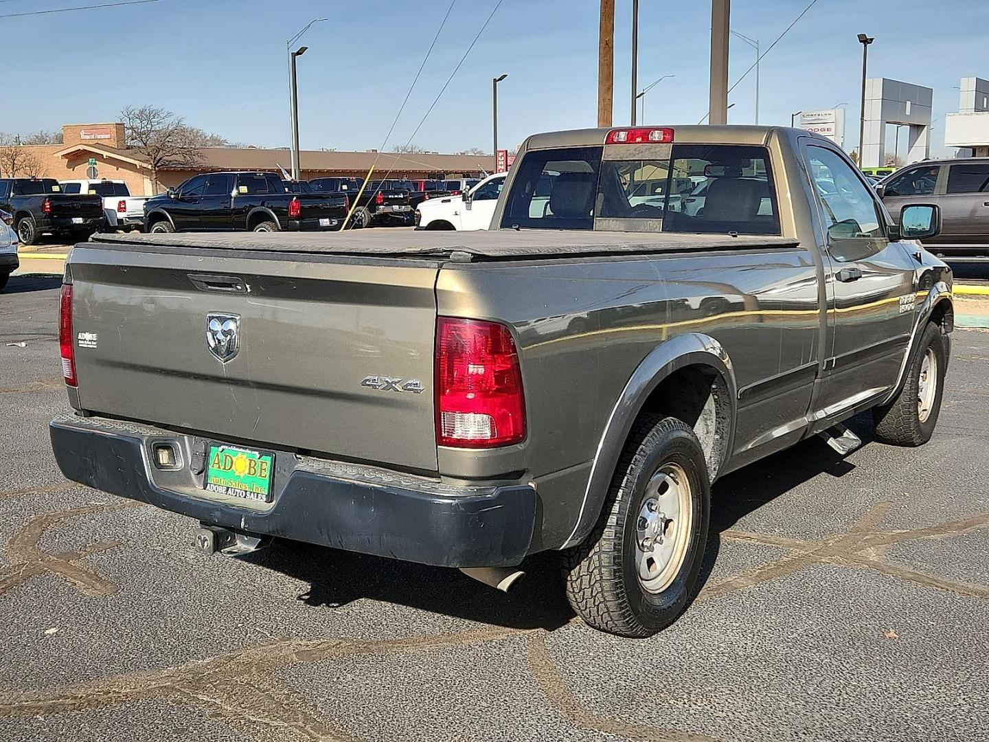2014 GOLD Ram 1500 Tradesman (3C6JR7DG0EG) with an 3.6L V-6 DOHC, variable valve control, regular unleaded, engine with 305HP engine, located at 4711 Ave Q, Lubbock, TX, 79412, (806) 687-2362, 33.551304, -101.855293 - Photo#3