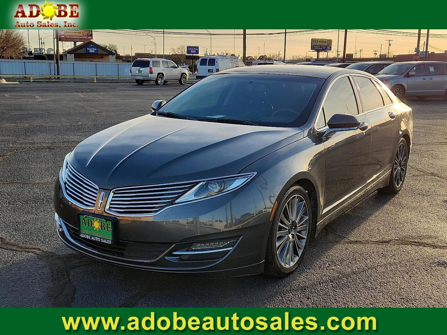 2016 GRAY Lincoln MKZ (3LN6L2G95GR) with an EcoBoost 2L I-4 gasoline direct injection, DOHC, variable valve control, intercooled turbo, premium unleaded, engine with 240HP engine, located at 4711 Ave Q, Lubbock, TX, 79412, (806) 687-2362, 33.551304, -101.855293 - Photo#0