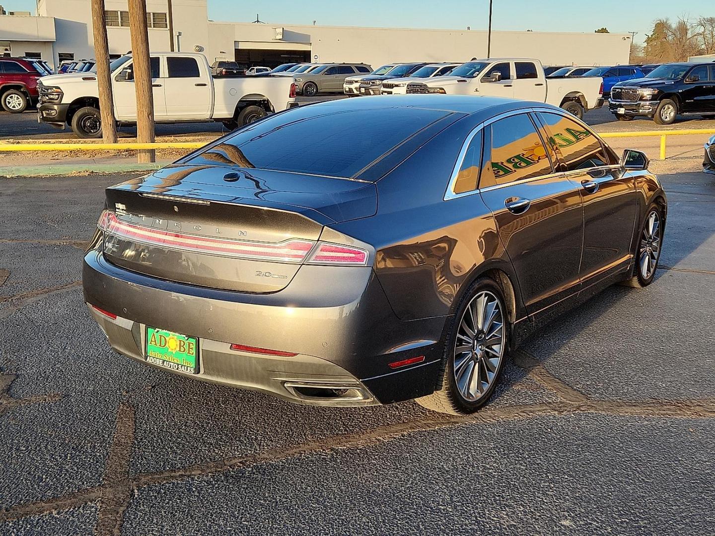 2016 GRAY Lincoln MKZ (3LN6L2G95GR) with an EcoBoost 2L I-4 gasoline direct injection, DOHC, variable valve control, intercooled turbo, premium unleaded, engine with 240HP engine, located at 4711 Ave Q, Lubbock, TX, 79412, (806) 687-2362, 33.551304, -101.855293 - Photo#3