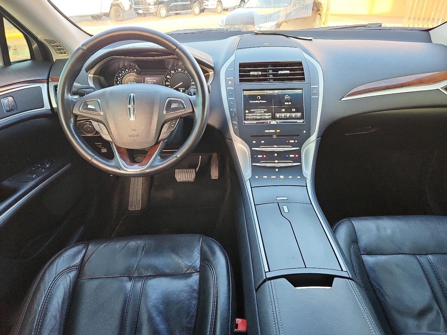 2016 GRAY Lincoln MKZ (3LN6L2G95GR) with an EcoBoost 2L I-4 gasoline direct injection, DOHC, variable valve control, intercooled turbo, premium unleaded, engine with 240HP engine, located at 4711 Ave Q, Lubbock, TX, 79412, (806) 687-2362, 33.551304, -101.855293 - Photo#10