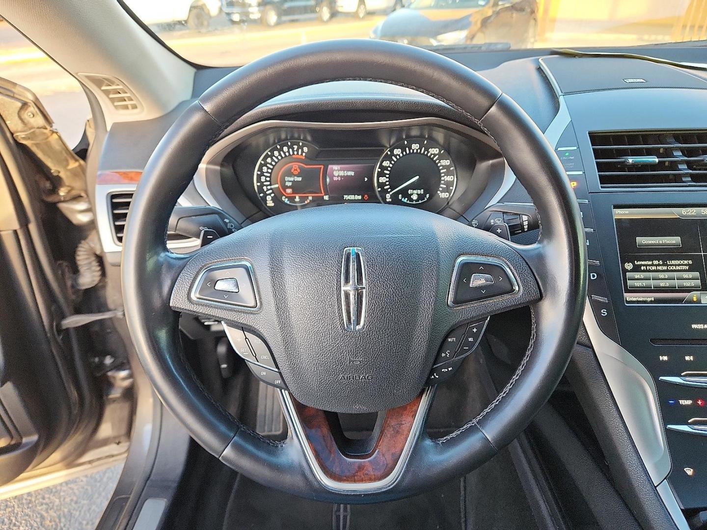 2016 GRAY Lincoln MKZ (3LN6L2G95GR) with an EcoBoost 2L I-4 gasoline direct injection, DOHC, variable valve control, intercooled turbo, premium unleaded, engine with 240HP engine, located at 4711 Ave Q, Lubbock, TX, 79412, (806) 687-2362, 33.551304, -101.855293 - Photo#19