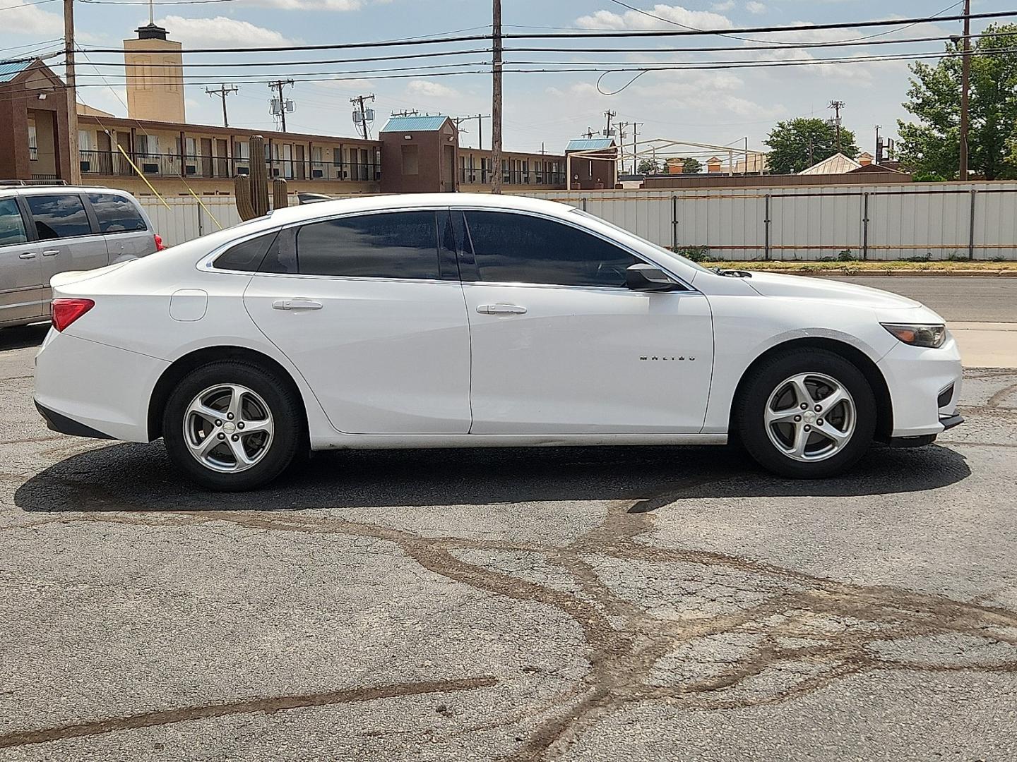 2018 WHITE /Jet Black - H1T Chevrolet Malibu 1LS (1G1ZB5ST1JF) with an ECOTEC 1.5L I-4 direct injection, DOHC, VVT variable valve control, intercooled turbo, regular gasoline, engine with 160HP engine, located at 4711 Ave Q, Lubbock, TX, 79412, (806) 687-2362, 33.551304, -101.855293- Photo#4