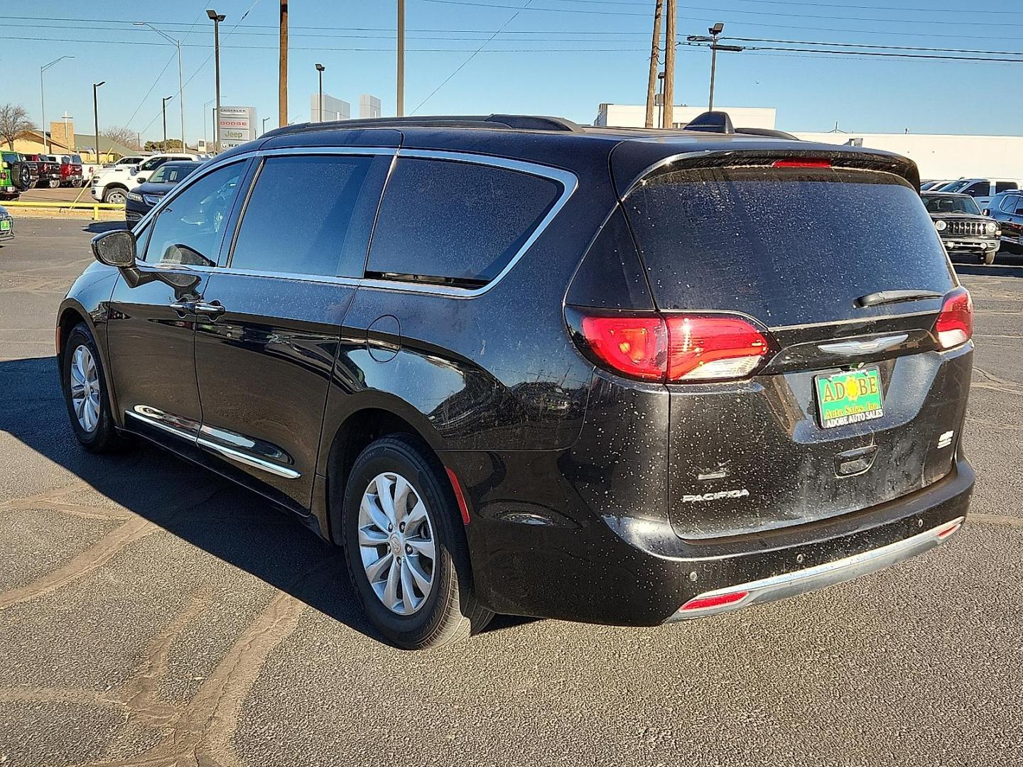 2017 BLACK Chrysler Pacifica Touring-L (2C4RC1BG1HR) with an Pentastar 3.6L V-6 DOHC, variable valve control, regular unleaded, engine with 287HP engine, located at 4711 Ave Q, Lubbock, TX, 79412, (806) 687-2362, 33.551304, -101.855293 - Photo#2