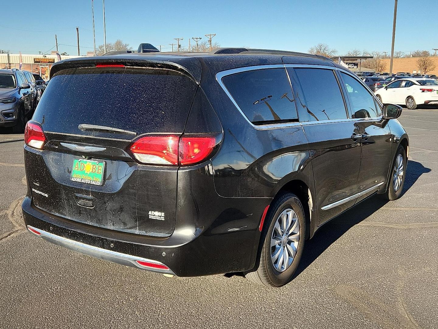 2017 BLACK Chrysler Pacifica Touring-L (2C4RC1BG1HR) with an Pentastar 3.6L V-6 DOHC, variable valve control, regular unleaded, engine with 287HP engine, located at 4711 Ave Q, Lubbock, TX, 79412, (806) 687-2362, 33.551304, -101.855293 - Photo#3