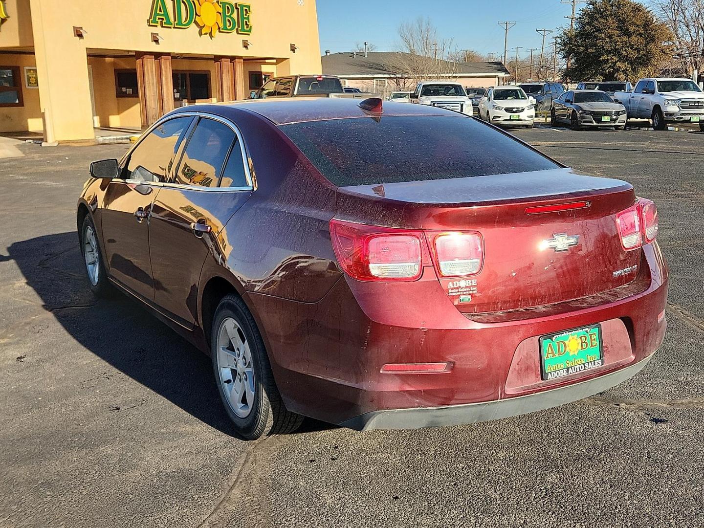 2016 RED Chevrolet Malibu Limited LT (1G11C5SA5GF) with an 2.5L I-4 gasoline direct injection, DOHC, variable valve control, regular unleaded, engine with 202HP engine, located at 4711 Ave Q, Lubbock, TX, 79412, (806) 687-2362, 33.551304, -101.855293 - Photo#2