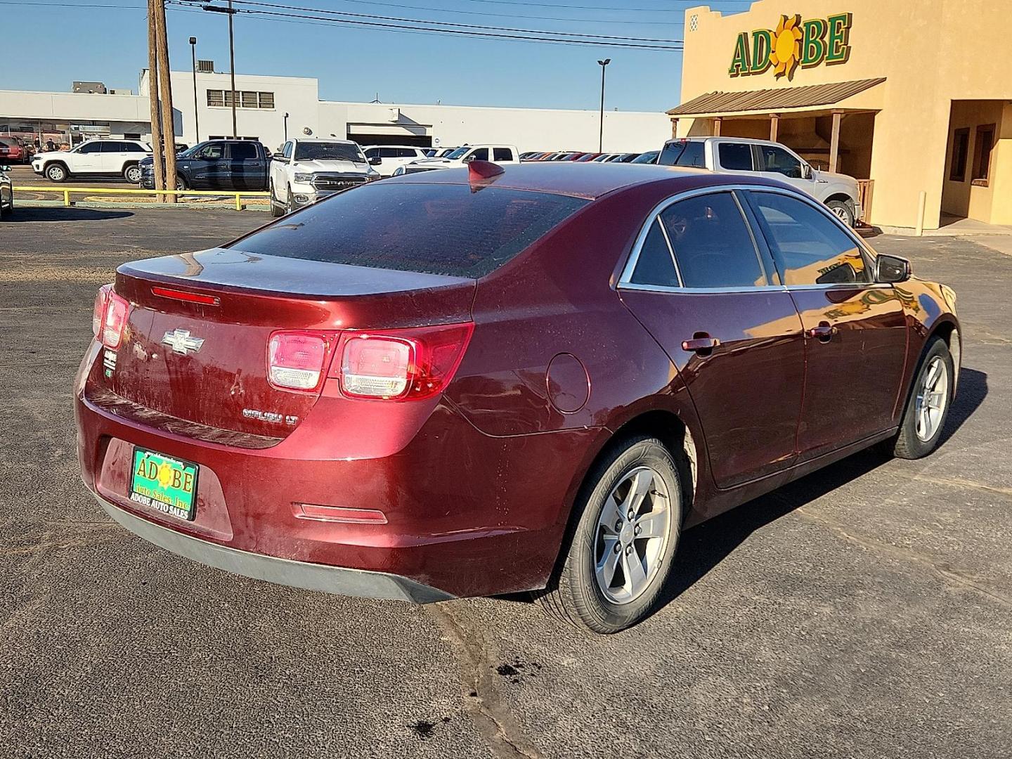 2016 RED Chevrolet Malibu Limited LT (1G11C5SA5GF) with an 2.5L I-4 gasoline direct injection, DOHC, variable valve control, regular unleaded, engine with 202HP engine, located at 4711 Ave Q, Lubbock, TX, 79412, (806) 687-2362, 33.551304, -101.855293 - Photo#3