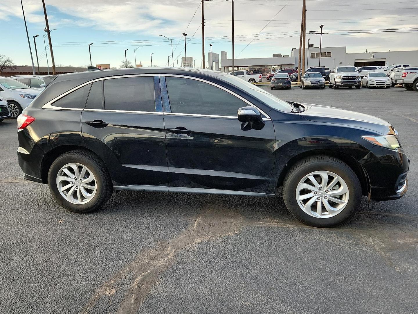 2017 BLACK Acura RDX w/AcuraWatch Plus Package (5J8TB3H33HL) with an 3.5L V-6 i-VTEC variable valve control, premium unleaded, engine with cylinder deactivation and 279HP engine, located at 4711 Ave Q, Lubbock, TX, 79412, (806) 687-2362, 33.551304, -101.855293 - Photo#4