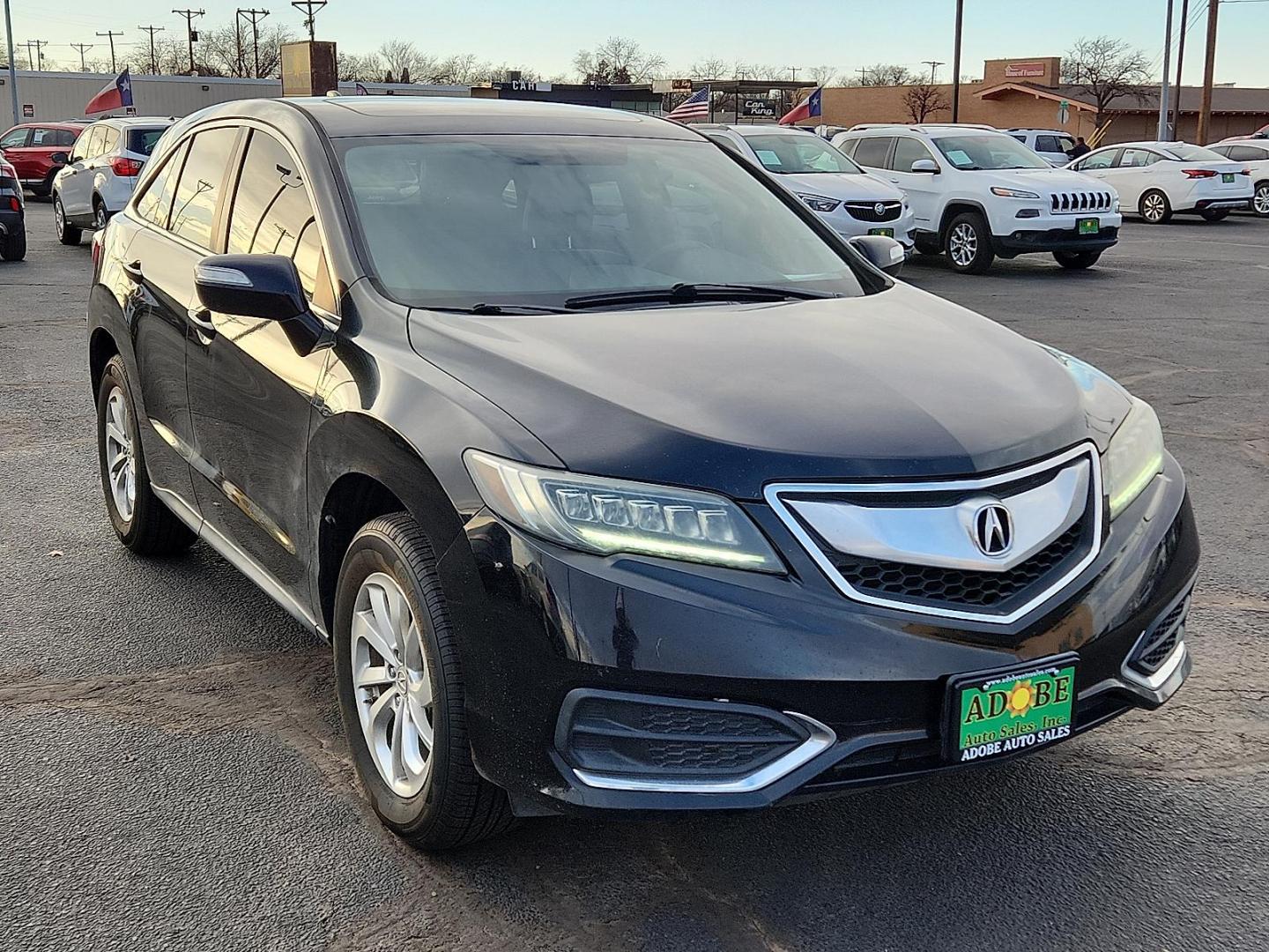 2017 BLACK Acura RDX w/AcuraWatch Plus Package (5J8TB3H33HL) with an 3.5L V-6 i-VTEC variable valve control, premium unleaded, engine with cylinder deactivation and 279HP engine, located at 4711 Ave Q, Lubbock, TX, 79412, (806) 687-2362, 33.551304, -101.855293 - Photo#5