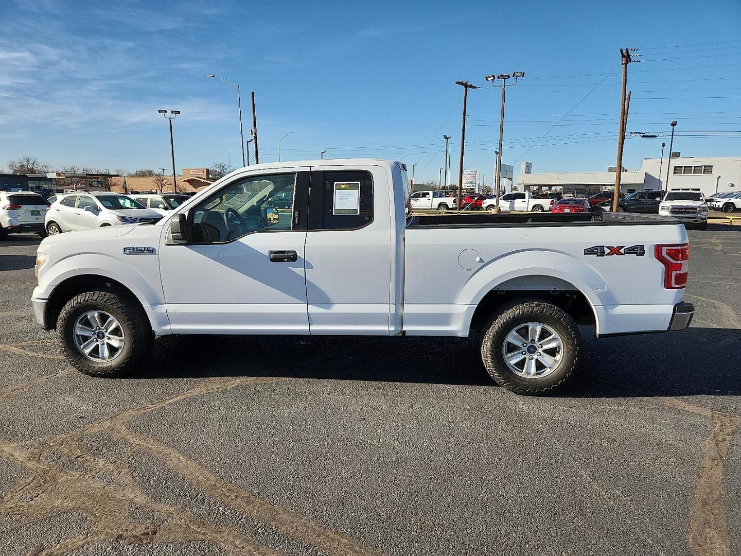 2019 WHITE Ford F-150 XLT (1FTFX1E58KK) with an 5L V-8 port/direct injection, DOHC, variable valve control, regular unleaded, engine with 395HP engine, located at 4711 Ave Q, Lubbock, TX, 79412, (806) 687-2362, 33.551304, -101.855293 - Photo#1