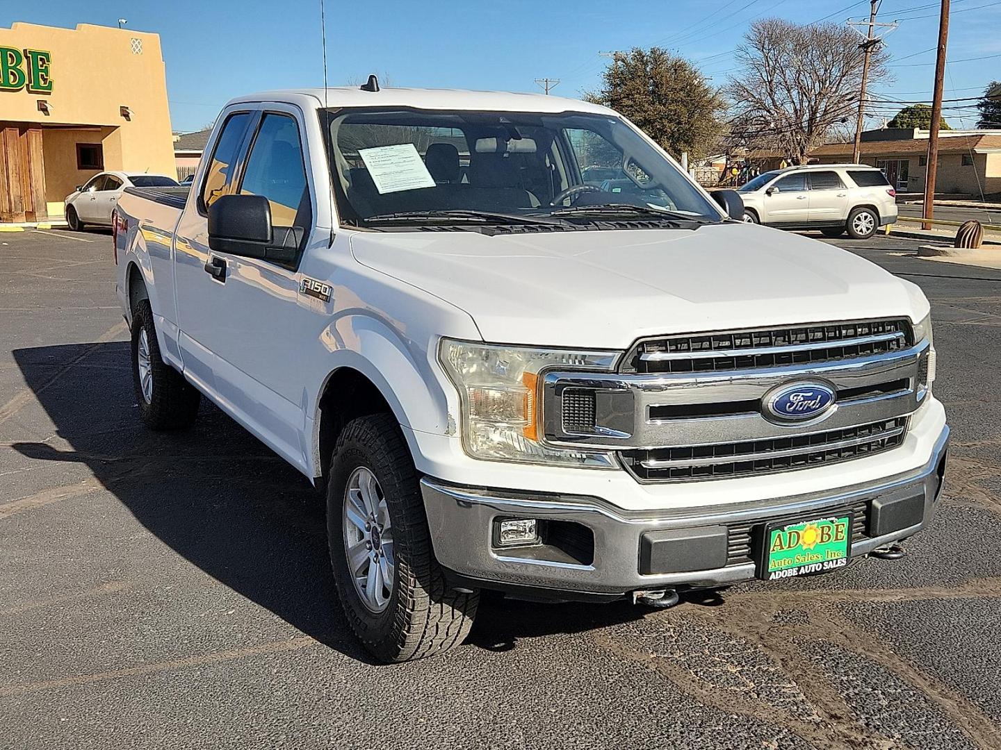 2019 WHITE Ford F-150 XLT (1FTFX1E58KK) with an 5L V-8 port/direct injection, DOHC, variable valve control, regular unleaded, engine with 395HP engine, located at 4711 Ave Q, Lubbock, TX, 79412, (806) 687-2362, 33.551304, -101.855293 - Photo#5