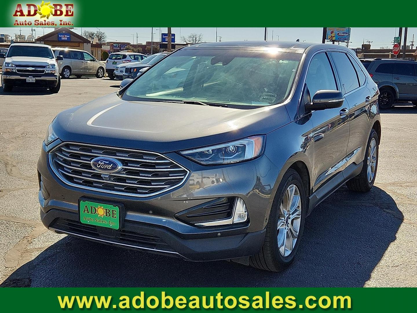 2019 GRAY Ford Edge Titanium (2FMPK3K91KB) with an EcoBoost 2L I-4 gasoline direct injection, DOHC, variable valve control, intercooled turbo, premium unleaded, engine with 250HP engine, located at 4711 Ave Q, Lubbock, TX, 79412, (806) 687-2362, 33.551304, -101.855293 - Photo#0
