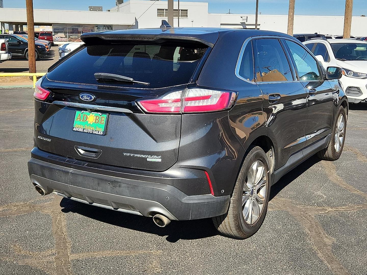 2019 GRAY Ford Edge Titanium (2FMPK3K91KB) with an EcoBoost 2L I-4 gasoline direct injection, DOHC, variable valve control, intercooled turbo, premium unleaded, engine with 250HP engine, located at 4711 Ave Q, Lubbock, TX, 79412, (806) 687-2362, 33.551304, -101.855293 - Photo#3