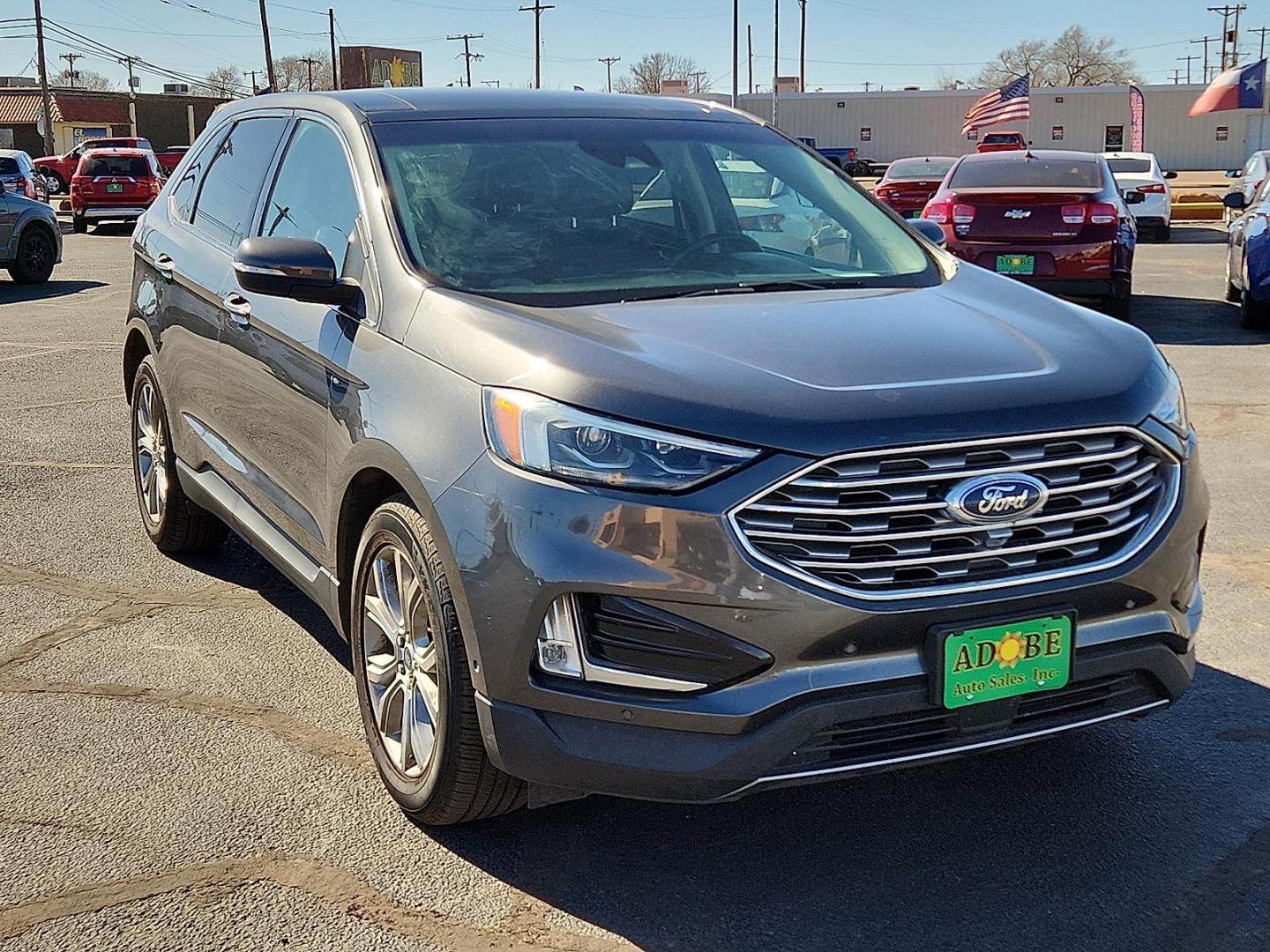 2019 GRAY Ford Edge Titanium (2FMPK3K91KB) with an EcoBoost 2L I-4 gasoline direct injection, DOHC, variable valve control, intercooled turbo, premium unleaded, engine with 250HP engine, located at 4711 Ave Q, Lubbock, TX, 79412, (806) 687-2362, 33.551304, -101.855293 - Photo#5