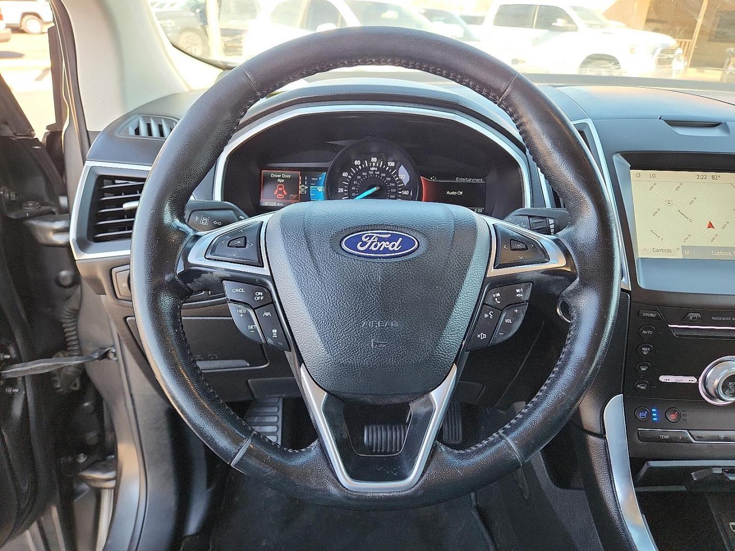 2019 GRAY Ford Edge Titanium (2FMPK3K91KB) with an EcoBoost 2L I-4 gasoline direct injection, DOHC, variable valve control, intercooled turbo, premium unleaded, engine with 250HP engine, located at 4711 Ave Q, Lubbock, TX, 79412, (806) 687-2362, 33.551304, -101.855293 - Photo#16