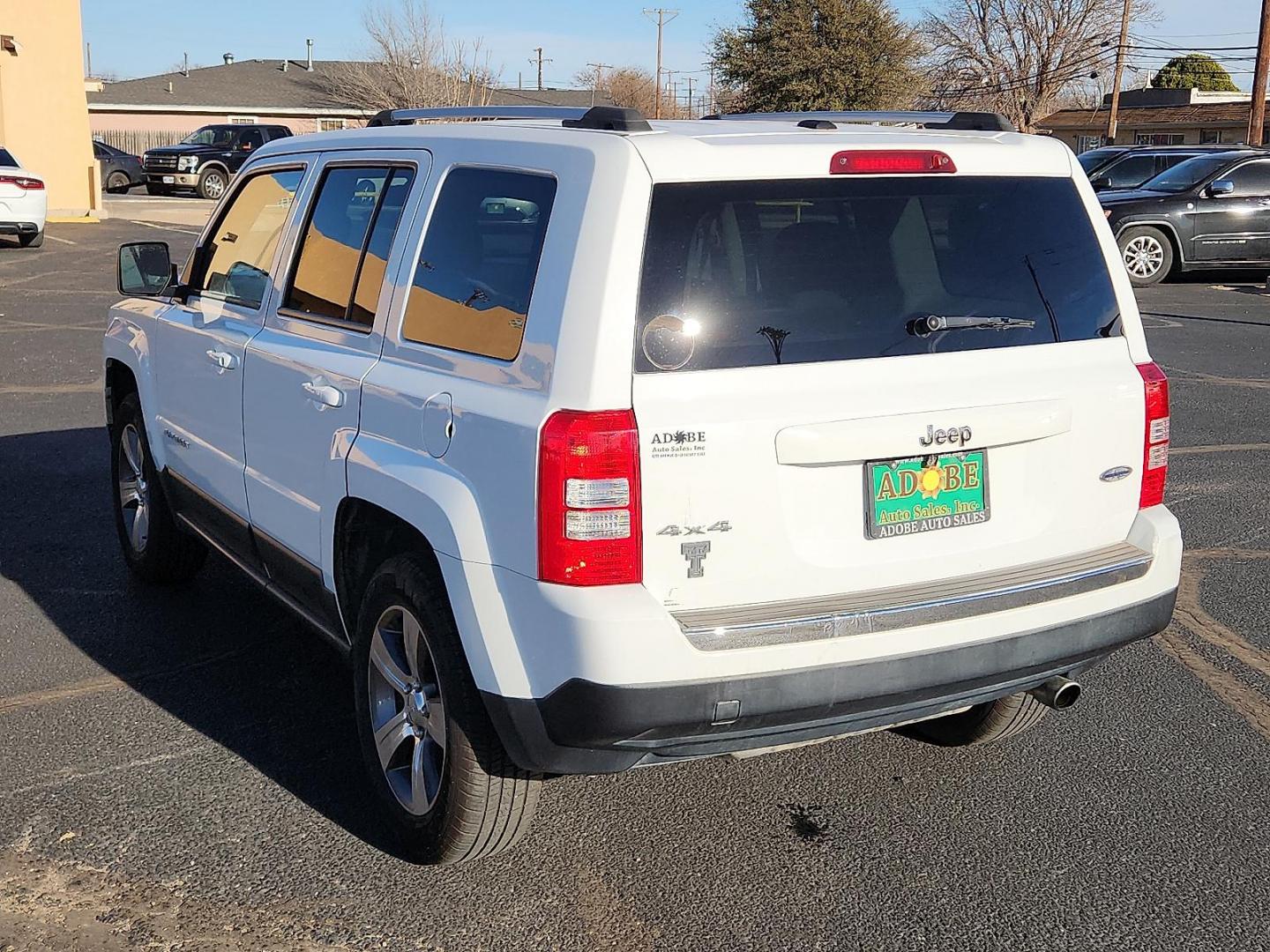 2017 WHITE Jeep Patriot High Altitude 4x4 (1C4NJRFB6HD) with an 2.4L I-4 DOHC, variable valve control, regular unleaded, engine with 172HP engine, located at 4711 Ave Q, Lubbock, TX, 79412, (806) 687-2362, 33.551304, -101.855293 - Photo#2