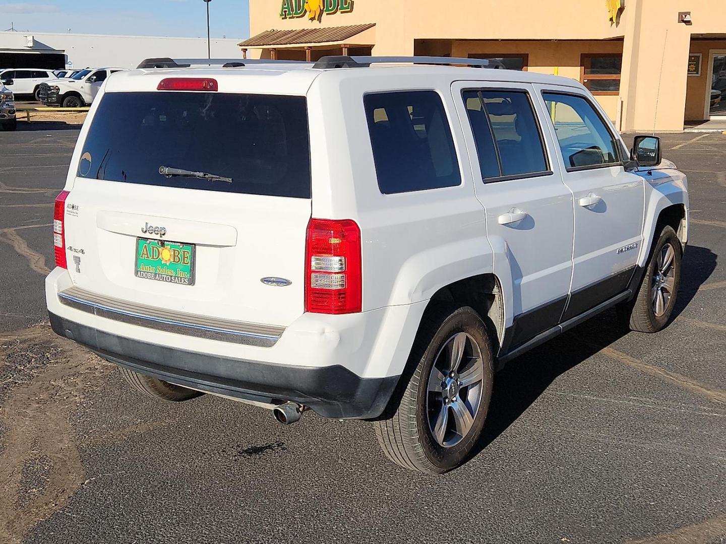 2017 WHITE Jeep Patriot High Altitude 4x4 (1C4NJRFB6HD) with an 2.4L I-4 DOHC, variable valve control, regular unleaded, engine with 172HP engine, located at 4711 Ave Q, Lubbock, TX, 79412, (806) 687-2362, 33.551304, -101.855293 - Photo#3