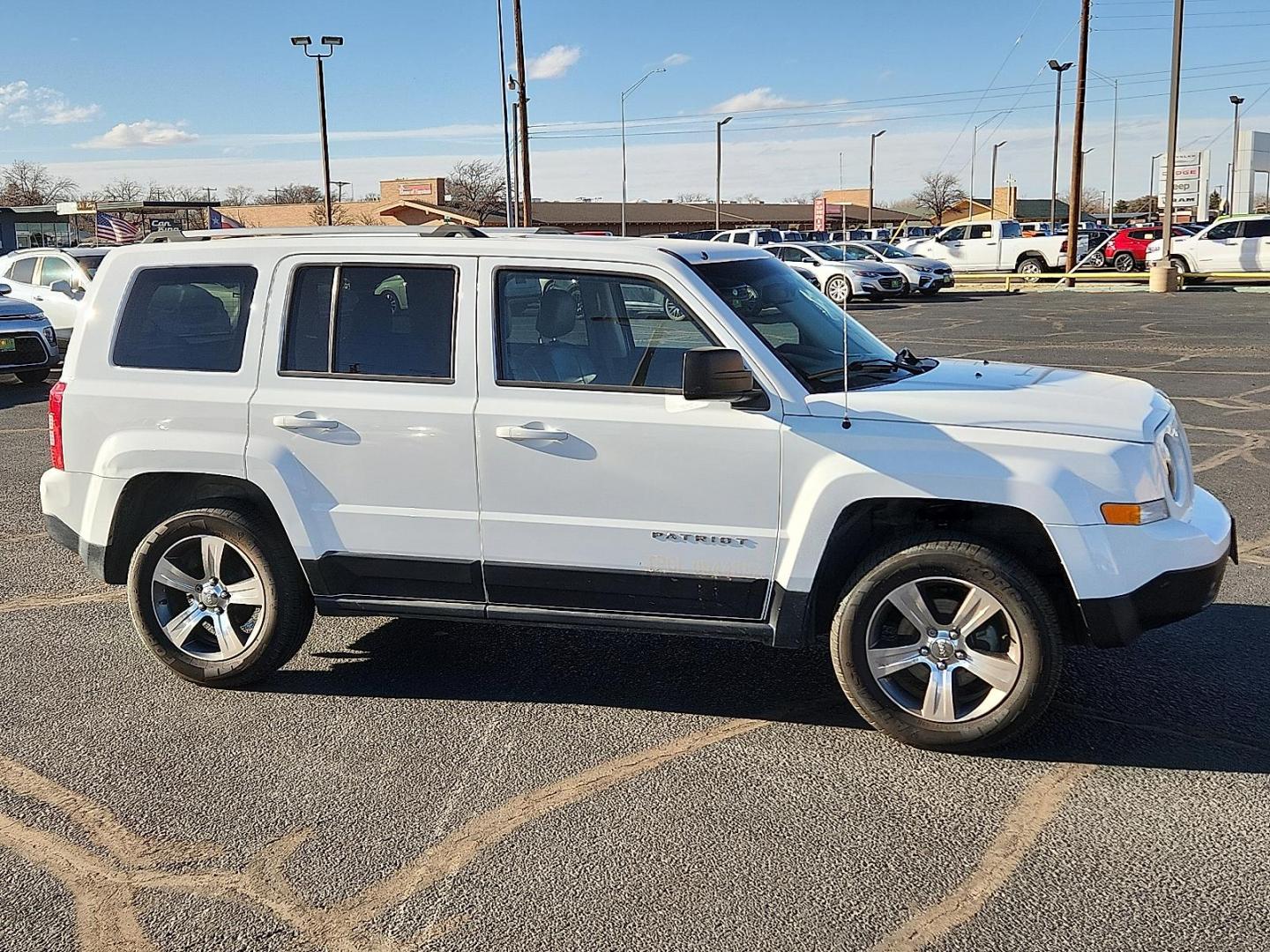 2017 WHITE Jeep Patriot High Altitude 4x4 (1C4NJRFB6HD) with an 2.4L I-4 DOHC, variable valve control, regular unleaded, engine with 172HP engine, located at 4711 Ave Q, Lubbock, TX, 79412, (806) 687-2362, 33.551304, -101.855293 - Photo#4