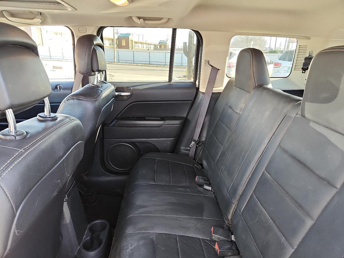 2017 WHITE Jeep Patriot High Altitude 4x4 (1C4NJRFB6HD) with an 2.4L I-4 DOHC, variable valve control, regular unleaded, engine with 172HP engine, located at 4711 Ave Q, Lubbock, TX, 79412, (806) 687-2362, 33.551304, -101.855293 - Photo#8