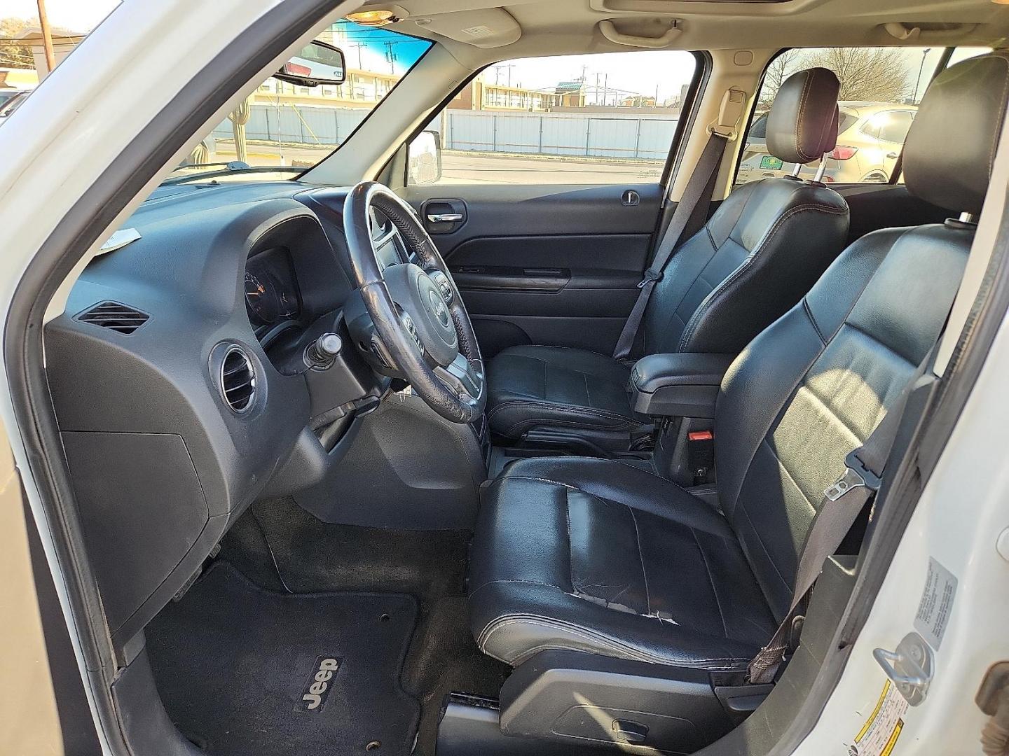 2017 WHITE Jeep Patriot High Altitude 4x4 (1C4NJRFB6HD) with an 2.4L I-4 DOHC, variable valve control, regular unleaded, engine with 172HP engine, located at 4711 Ave Q, Lubbock, TX, 79412, (806) 687-2362, 33.551304, -101.855293 - Photo#10